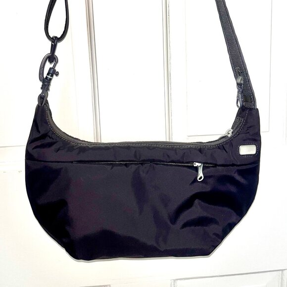 PACSAFE ANTI-THEFT CROSSBODY TRAVEL BAG BLACK - Picture 1 of 3